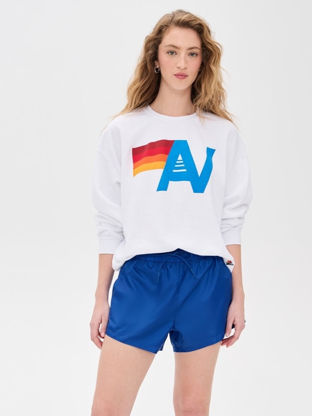 Aviator Nation White Hoodie with Blue AV Logo and Retro Red-Orange-Yellow Stripe